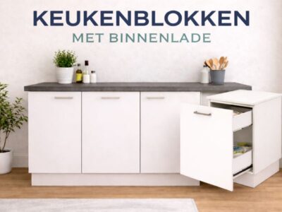 Keukenblok met binnenlade, witte kastdeuren en donker werkblad in rustige keukenopstelling
